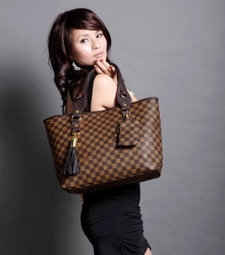 Grid single shoulder tassle bag