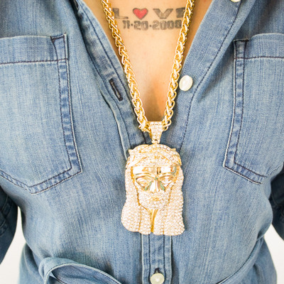 Gold chain with jesus medallion with crystals