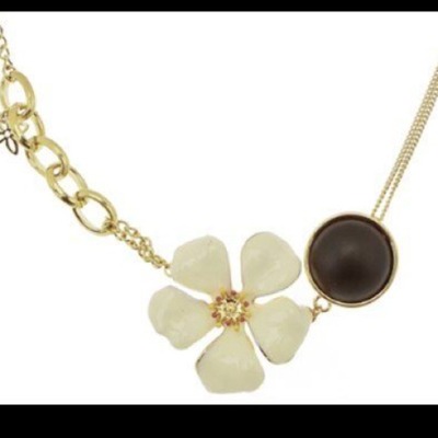 Fossil gold tone cream flower charm necklace
