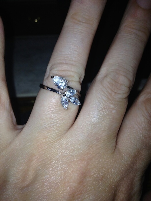 Four cz stones shaped as a flower white gold plated
