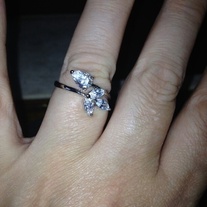 Four cz stones shaped as a flower white gold plated