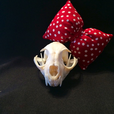 Stuffed red "minnie" polka dot bow