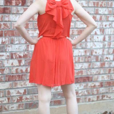 Orange bow back dress