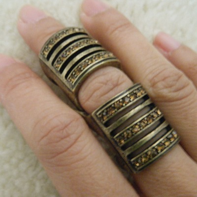 (new with tags) antique gold knuckle ring with brown gems