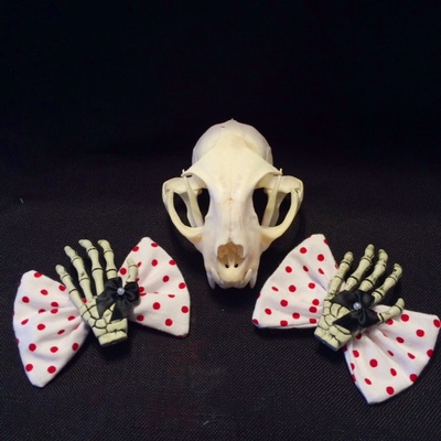 White polka dot skeleton hand