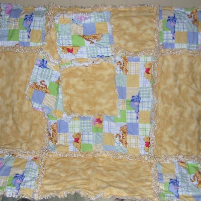 Winnie the pooh baby rag quilt and matching burp cloths