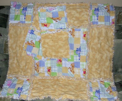 Winnie the pooh baby rag quilt and matching burp cloths