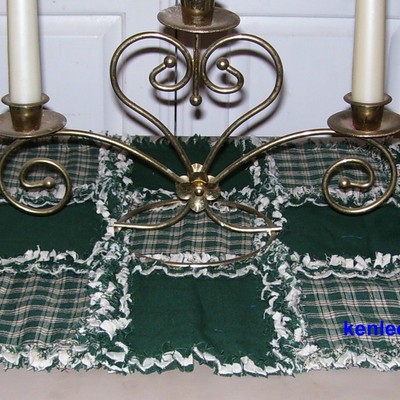 Green homespun rag quilt table runner