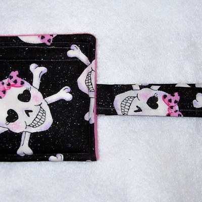 Skulls with hot pink wristlet coin purse