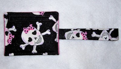 Skulls with hot pink wristlet coin purse
