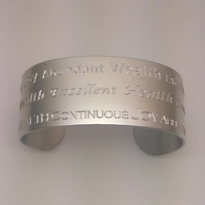 Abundant wealth health joy pewter cuff