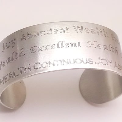 Matte finish abundant wealth health joy sterling silver cuff
