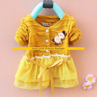 Mustard yellow cardigan with flowers, buttons, ribbon ties, lace trim and chiffon ruffles. sizes 12/18m, 18/24m, and 3t