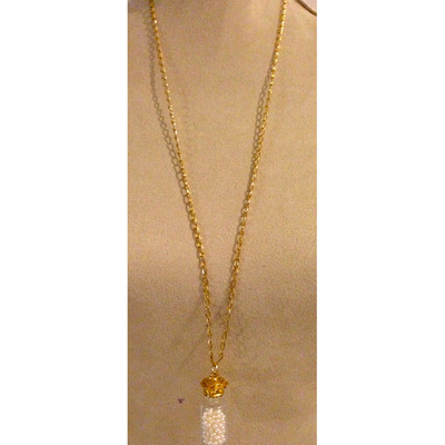 Long Gold Chain With a Pendant of Pearls