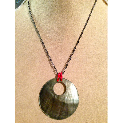 Black oval pendant on black simple chain