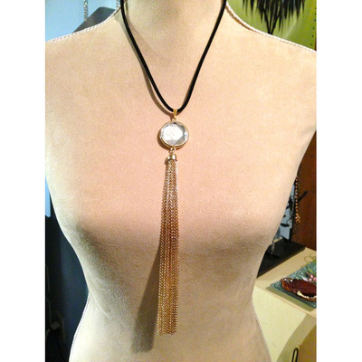 Long chain pendant on black ribbon chain