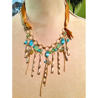 Dangling Jewels from a Ribbon Chain