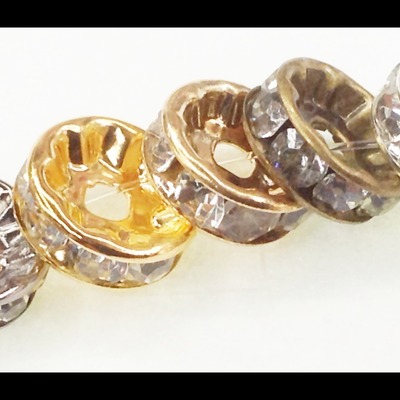 10mm crystal spacers. 100pcs. (clear)