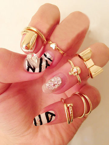 7PCS Set of Rings includes skull, bowknot, heart, and others 