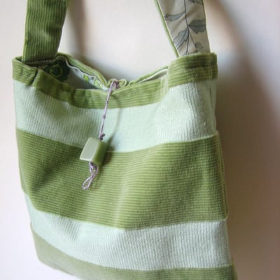 Eco friendly celery green purse with silk floral lining