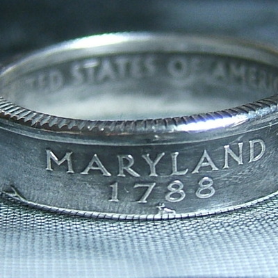 You pick the state 90% silver quarter ring