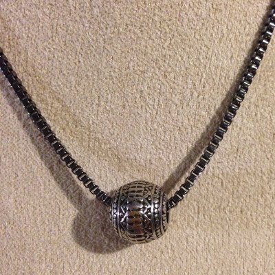 Silver ball on chain