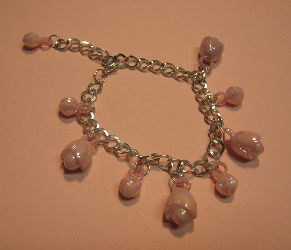 Metal & Pink Plastic Charm Bracelet