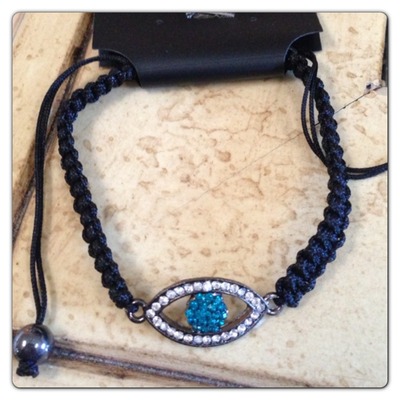 Black evil eye bracelet with blue eye