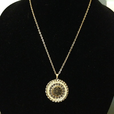 Ornate Pendant on gold chain
