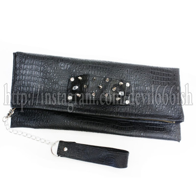 Dark monster clutch bag