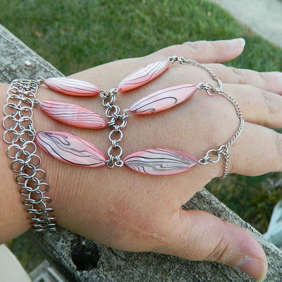 Pink multi finger bracelet