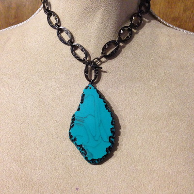 Black detail chain with turquoise pendant