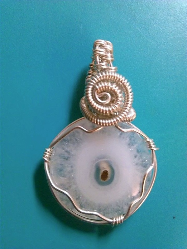 Sterling Silver wire wrapped Solar Quartz pendant