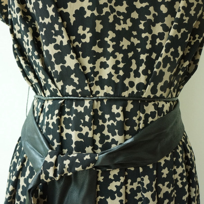 How and what black beige pattern dress with faux-leather belt