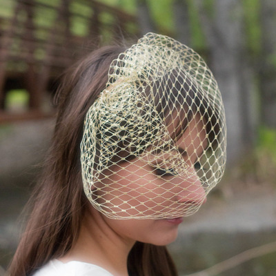 Metallic birdcage veil