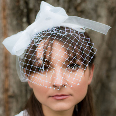 Birdcage veil headband with polka dot bow 