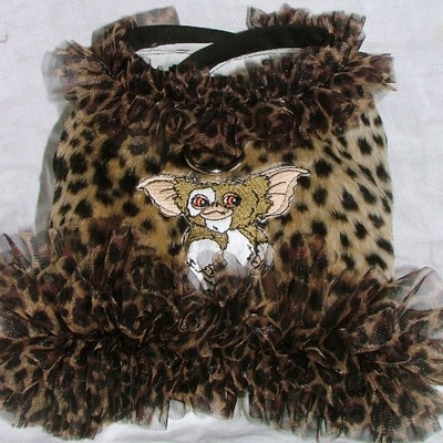 Leopard faux fur and the gremlin harness vest!