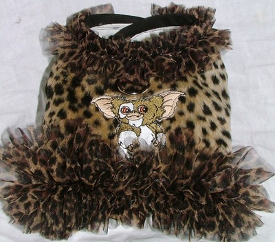 Leopard faux fur and the gremlin harness vest!