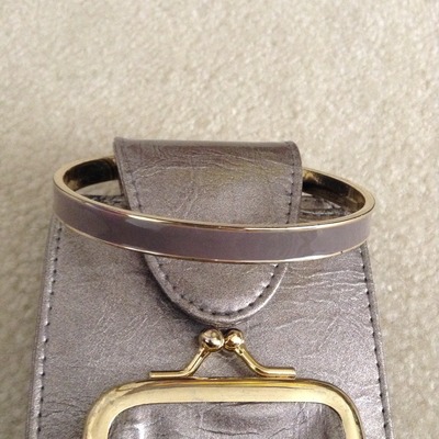 Wallet with detachable bangle