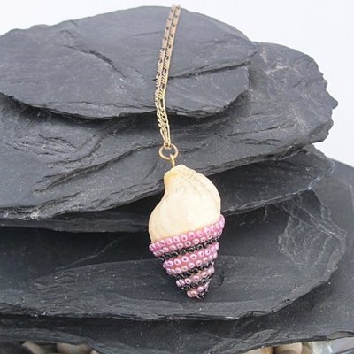 Purple, pink, and black bead encrusted sea shell necklace