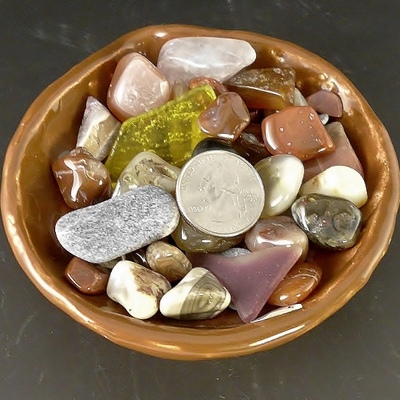 Small brown ceramic treasure bowl