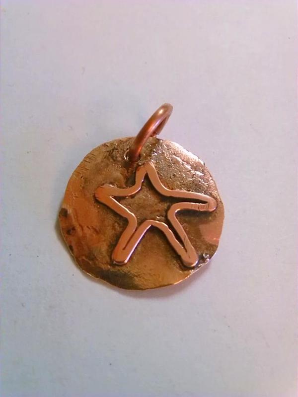 copper star hand hammered penny pendant