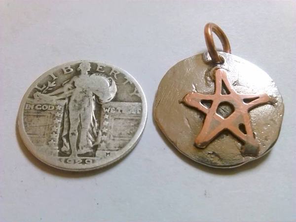 contrasting copper star hand hammered nickel pendant
