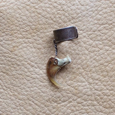 Real bobcat claw on silver-plated brass ear cuff