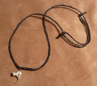 Real bobcat claw on hand-braided adjustable cord necklace