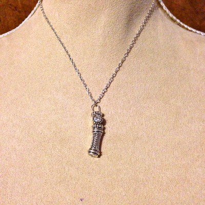 Delicate pendant on silver chain
