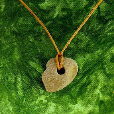 Holey stone on leather unisex necklace
