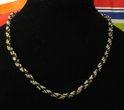 Hand woven glass beaded spiral rope - metallic green and black