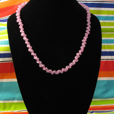 Hand woven glass beaded spiral rope - pink and clear