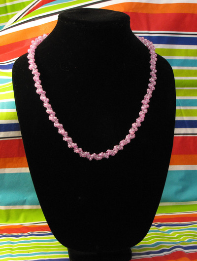 Hand woven glass beaded spiral rope - pink and clear